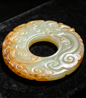 Chinese Carved Celadon Jade Bi Disc with Dragon and Cloud Motifs